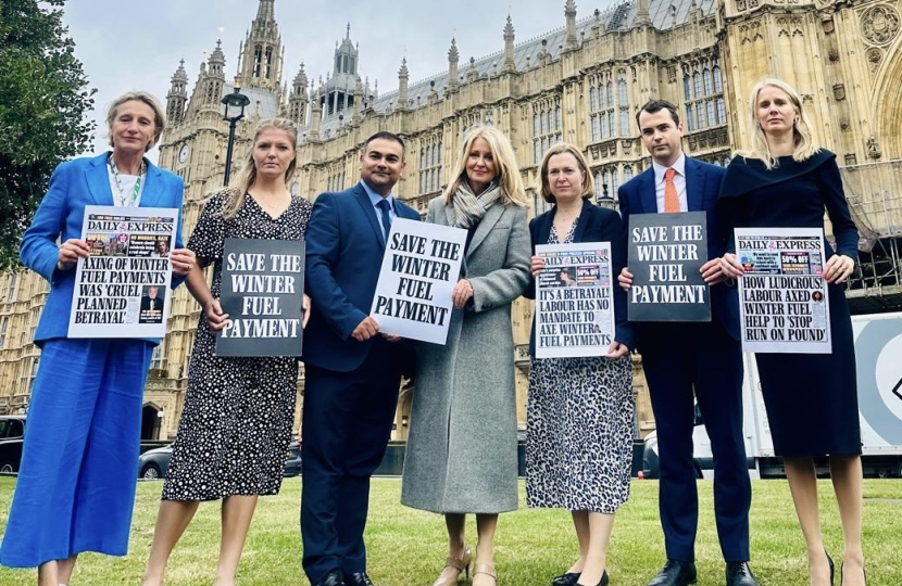 Rebecca Paul MP with Conservative colleagues protesting Winter Fuel Payment Cut