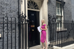 Rebecca Paul delivering Fairer Road Funding petition to No 10 June 2022